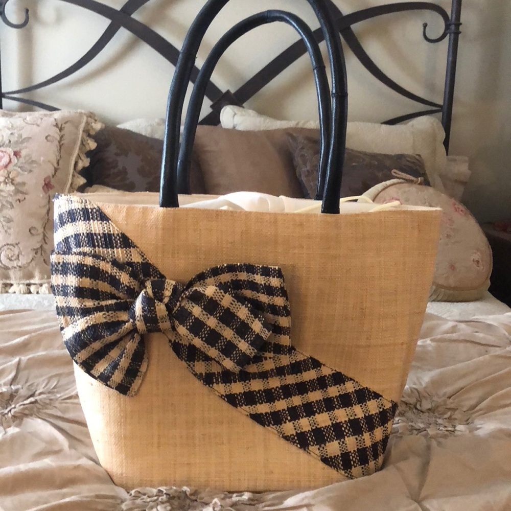 Woven grass purse with large bow